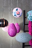 Lanterns and piñata suspended from ceiling