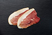 Two slices of ham on the bone from acorn-fed pigs