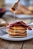 Pancakes with bacon and honey
