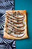 Blue cheese, pear, and thyme tart