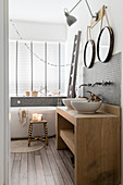 Festive decorations in rustic bathroom in natural shades