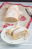 Blueberry roulade with icing sugar