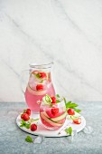 Strawberry lemonade with fresh strawberries, cucumber and mint