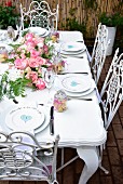 Place settings with painted hearts on a festively laid table