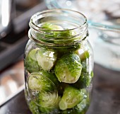 Pickled brussels sprouts in a glass jar