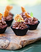 Dark chocolate and beetroot cupcakes with sesame brittle