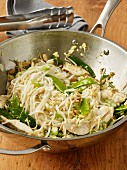Pad Thai in a stainless steel wok