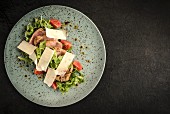 Sliced pork fillet with Parmesan