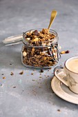 Granola with chocolate in a glass jar