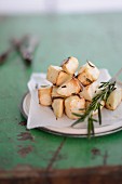 Fried celery cubes with rosemary