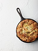 Strata (bread roll) in a frying pan