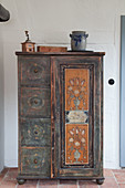 Old, painted farmhouse cabinet with door and four drawers