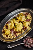 Cauliflower couscous with red onions and raisins