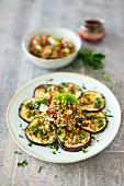 Baked aubergine slices with lentils