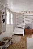 Foyer in Scandinavian country-house style with double doors and staircase