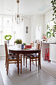 Antique wooden table in Scandinavian country-house kitchen