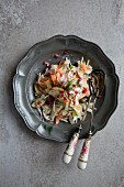 Fennel coleslaw on a silver plate