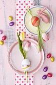 Tulips in eggs decorated wit washi tape decorating table