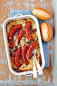 Sausage baked with onion