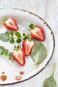 Strawberries in an enamel dish