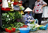 Gemüsehändlerin in Ho-Chi-Minh-Stadt, Vietnam