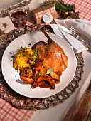 Roast goose with pumpkin wedges and puree