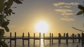 Sunset timelapse behind a pier in the Florida Bay