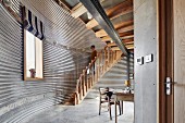 Wooden staircase in converted silo