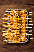 Satay skewers ready to grill