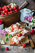 Bars with strawberries, coconut meringue and pistachios
