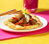 Roasted beef and peppers on Naan bread