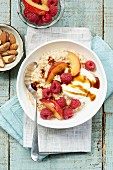 Porridge with plums and raspberries