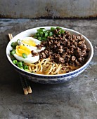 An Indonesian dish with mince, noodles and boiled eggs