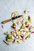 Chopped artichokes with a knife