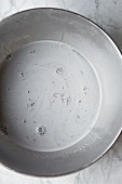 Black sesame milk in a stainless steel bowl