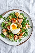 Potato and herb salad with honey roasted salmon and soft boiled egg