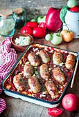 Sausages baked with vegetables and tomato sauce