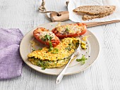 Herb omelette with grilled tomatoes