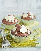 Cupcakes with chocolate candies, hearts and stars
