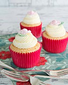 Cupcakes with buttercream and sugar roses