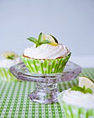 Cupcake with lime frosting and mint