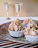 Cupcakes with buttercream and walnuts