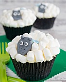 Cupcakes with marshmallows and an animal figure