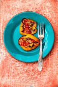 Yellow peppers stuffed with tomatoes, anchovies and capers (Piedmont, Italy)