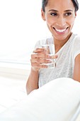 Woman with glass of water