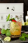 A chilli and pineapple cocktail with mint and lime