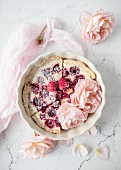 A raspberry tart with roses