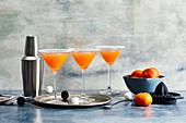 Three mandarin cocktails