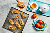 Mandarin and oat bars with a cup of tea