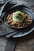 Vegan cucumber noodles with soya goulash and lingonberries
